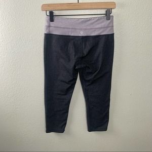 LULULEMON DARK GRAY CROP WITH PURPLE WAISTBAND WOMES SZ 6